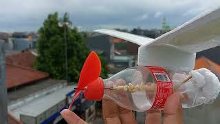 Coke Bottle become a rubber-powered plane