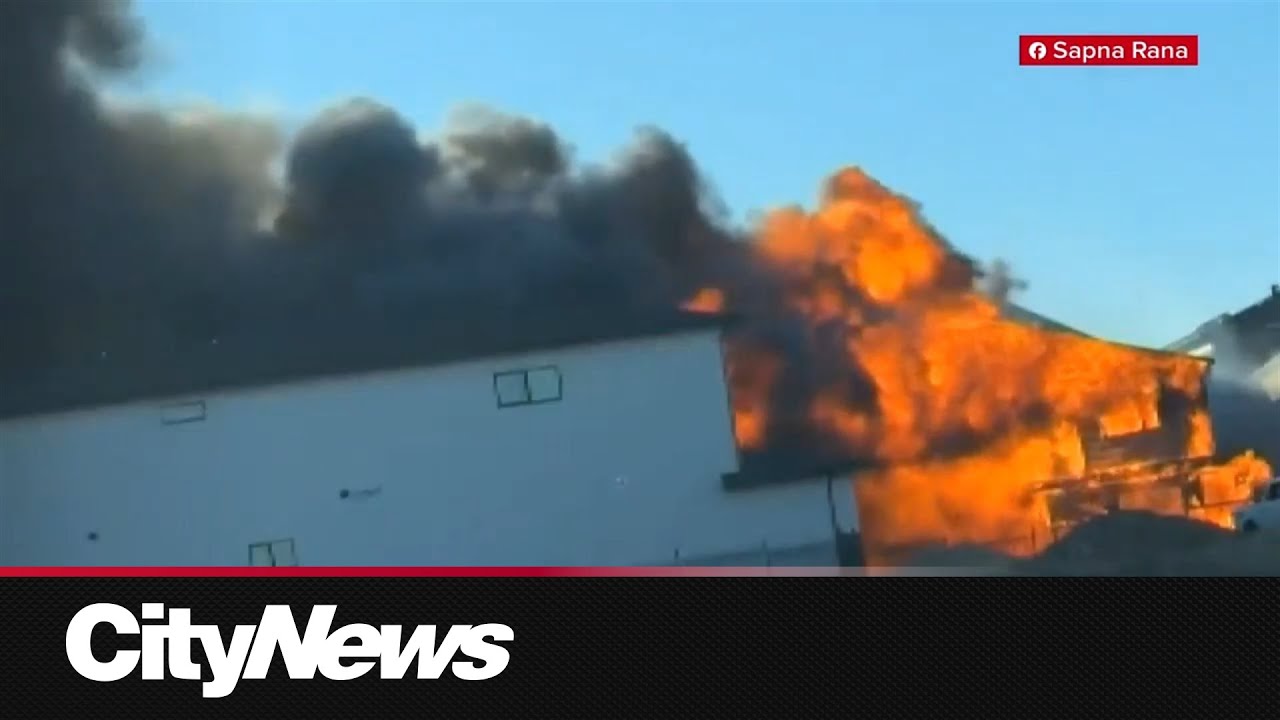 Structure fire damages homes under construction east of Calgary - YouTube