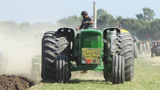 Big Tractors Plowing