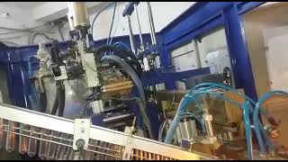 DYNAMIC MINI AUTO 4 CAVITY PET BLOW MOULDING MACHINE. (+91 9830664564)