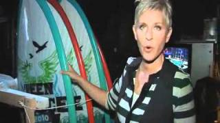 Ellen Eyes the Teen Choice Award Trophies(08/09/10)