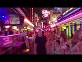 Walking down famous street at night in bangkok sukhumvit soi cowboyso many beautiful ladies