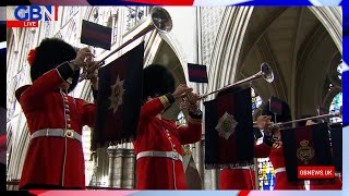 Funeral of Queen Elizabeth II: The congregation stands as the Last Post is played