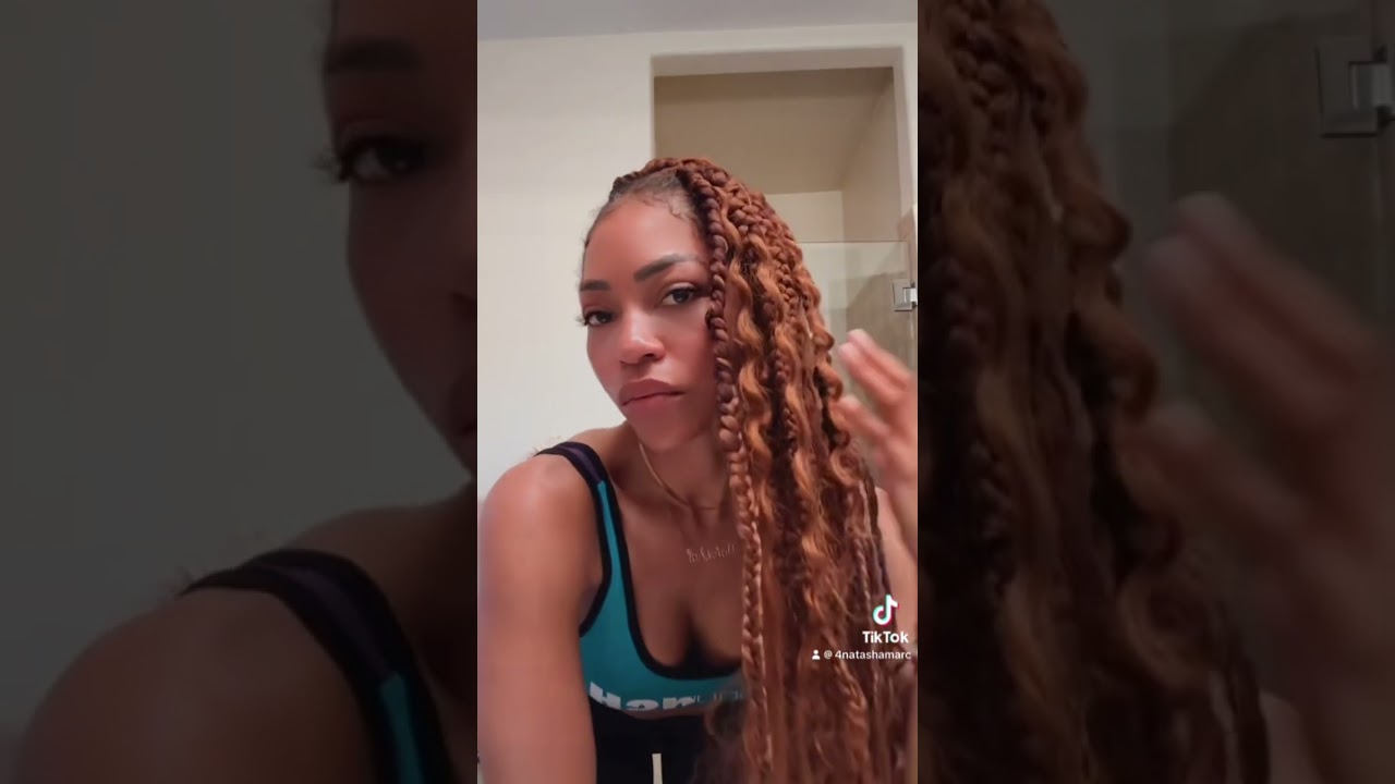 Natasha Marc doing her own hair