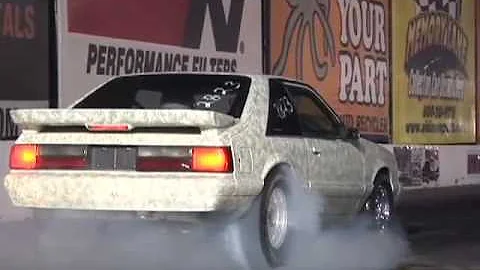 Chuck Spiker drives the Army Mustang 1