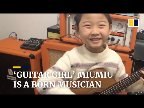 ‘Guitar girl’ Miumiu, 6, is a born musician