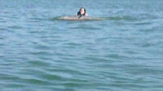 mom gets up for ythe first time on wakeboard