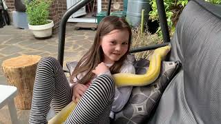 Reticulated Python swing adventures on the swing seat.