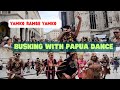 Eki  busking with papua dance  in the street of milan 