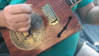 The Ray Reso   a 4 string cigar box resonator cigar box guitar built by The English Guitar Company a