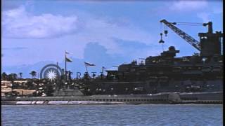 A US submarine arrives along the side of a tender in the Pacific Theater. HD Stock Footage