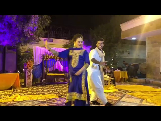 Asma Abbas and Azaan Sami Khan on the dance floor at a engagement ceremony. class=