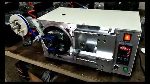 Automatic big EE core taping machne. For transformers.