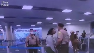 Police officer strikes woman during dispute at Miami airport
