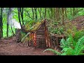 Un abri de survie complet avec foyer cabane en terre toit en mousse foyer en terre et pierre