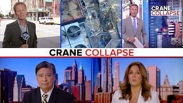 11 injured after burning crane sends debris plummeting to ground below