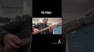“Me Piden” on acoustic guitar