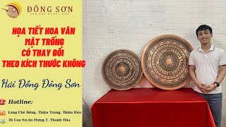 Hoạ tiết hoa văn mặt trống có thay đổi theo kích thước không ?