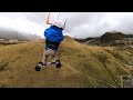 Extreme kite landboarding flights in the alps