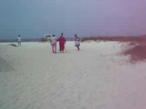 Old Lady Walking With A Cane On The Beach You Old Lady Walking With A Cane On The Beach