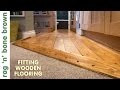 Laying Wooden Flooring In A Kitchen