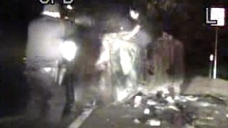 Cop shoots suspect escaping crashed car