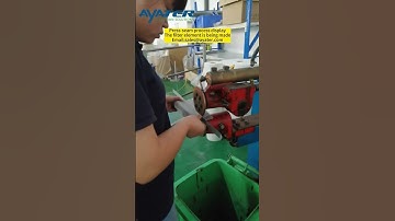 Press-seam process display. The filter element in being made.