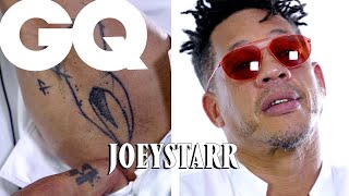 JoeyStarr dévoile ses tattoos : NTM, Béatrice Dalle, Scorpion... | GQ