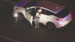 Chase suspect waves at chopper before arrest