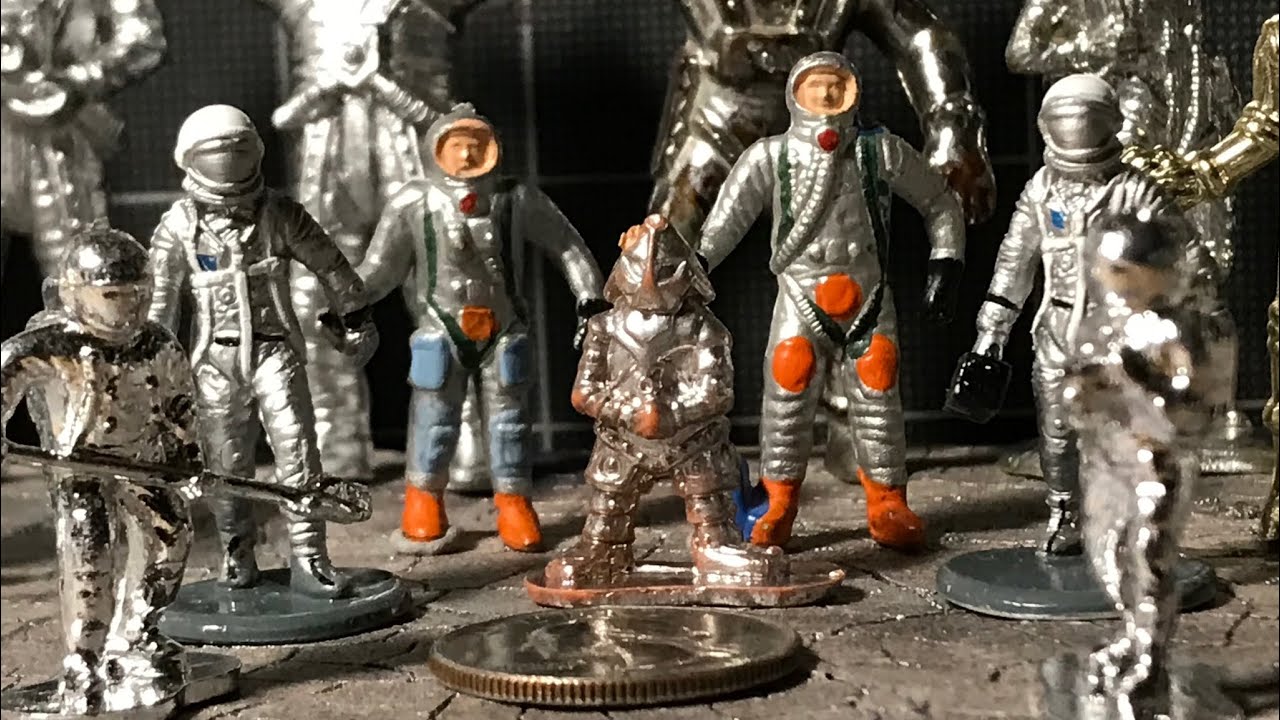 Chromed Spaceman Figures from Around the World & “The Ring of Bling”
