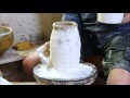 Mike Dodd demonstrates throwing and modifying a pot