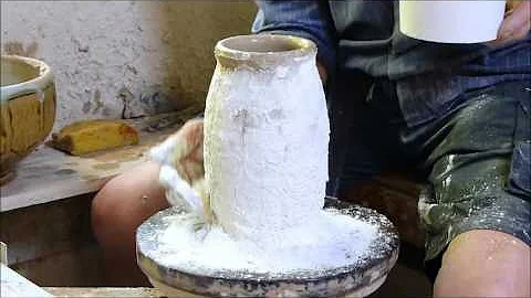 Mike Dodd demonstrates throwing and modifying a pot