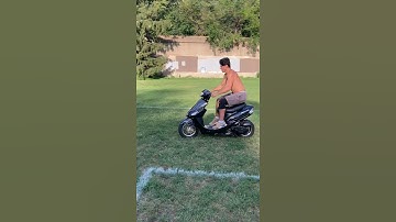 How to Wheelie on a moped