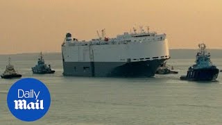 Stricken cargo ship towed back to Southampton docks - Daily Mail