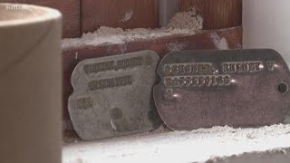 Dog tags found in Fort Smith building's wall