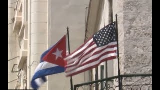 US urges no travel to Cuba, cuts embassy staff