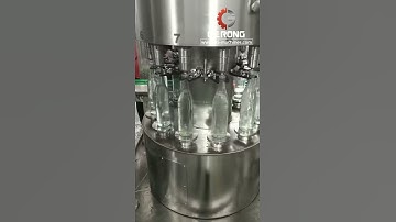 Alcohol liquid strong liquor rotary glass bottle rotary vacuum filling machine testing video