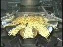 Ishida multi-head weigher quickly & accurately weighs french fries & frozen foods | Heat and Control