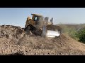 Caterpillar D9T Bulldozer Pushing Soil