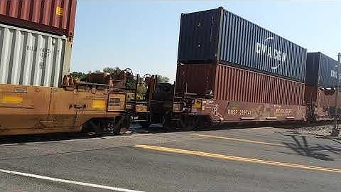 BNSF C44-9W #4045 & BNSF ES44C4 #7198 with a northbound S-OMATAC stack train passing MP 6.06.