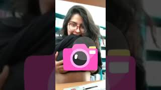 Girl Showing Her Noob In Library