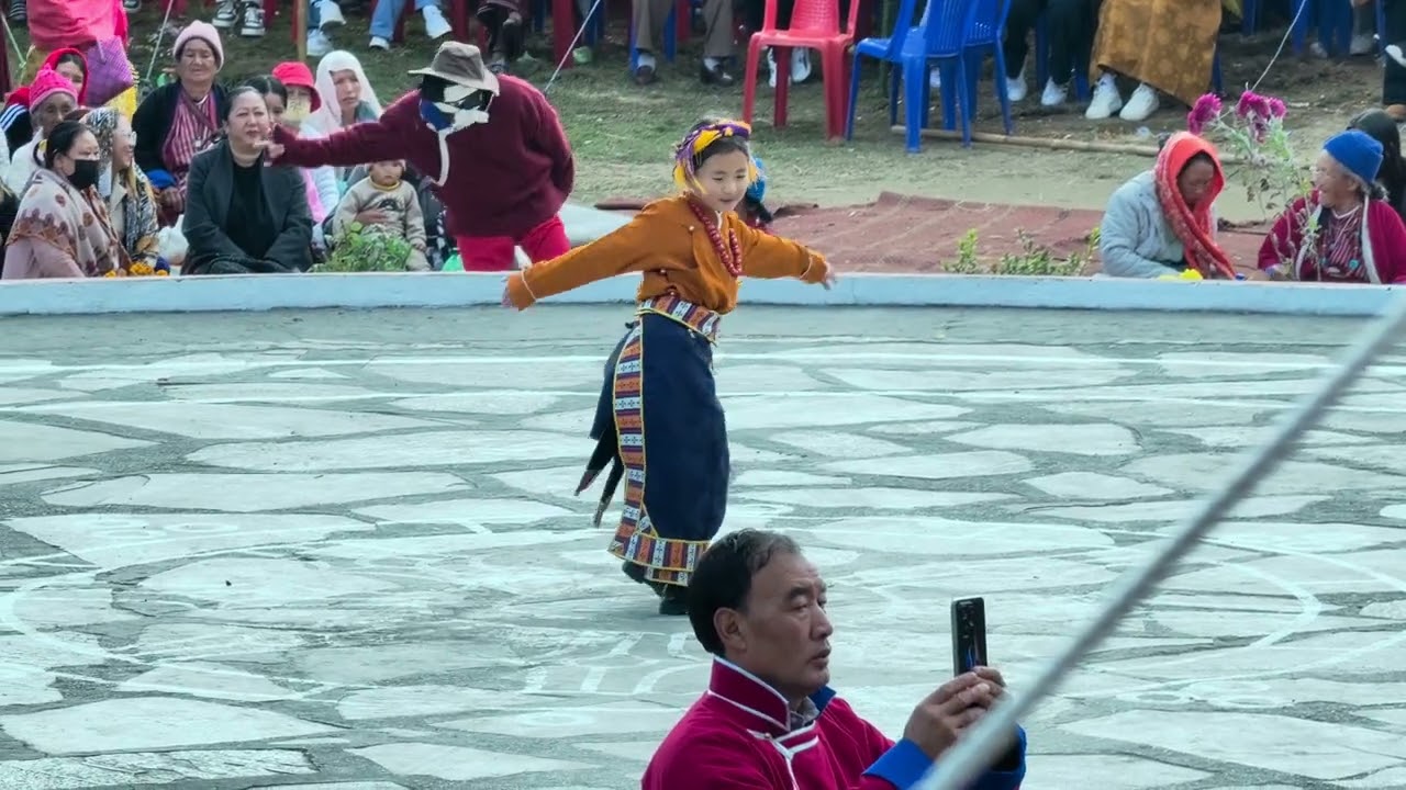 Little girls yangzom dance in Tibetan songs at Torgya Festival Bomdila. 
