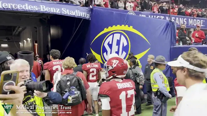 Alabama players and coaches leave the field following SEC Championship loss to Georgia