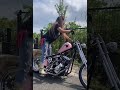 Biker girl kicking that pink Harley-Davidson chopper again!!!