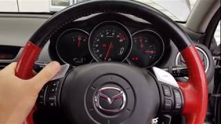 RX-8 6spd MT, DSC control off the steering wheel