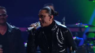 U2 and The Black Eyed Peas perform \