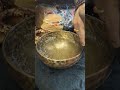 Tibetan singing bowl charging water at high frequency vibration Nepal Kathmandu 20230926 112640