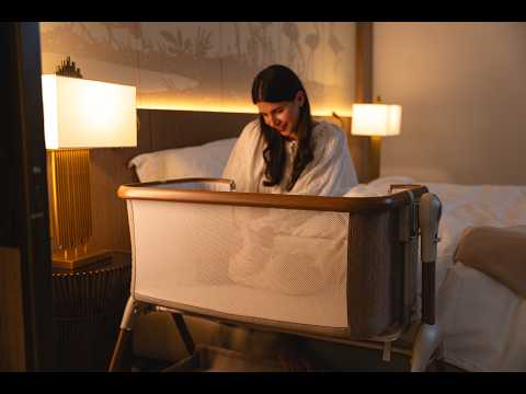 Nest Glide Co-Sleeper Bedside Crib gently glides to soothe your baby to sleep.