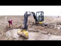 Fixing Erosion and Hauling Rock with Excavator and Dump Truck - Includes DRONE footage!