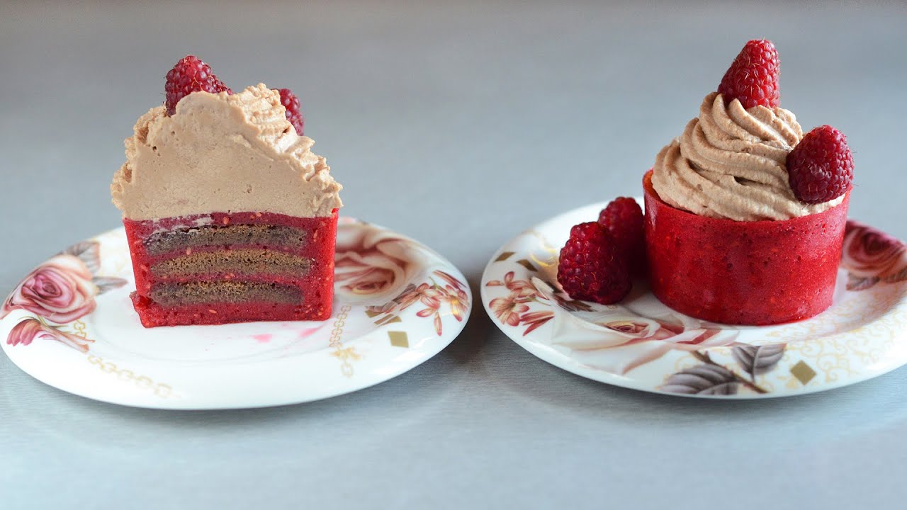 Chocolate filled pumpkin cupcake with raspberry topping